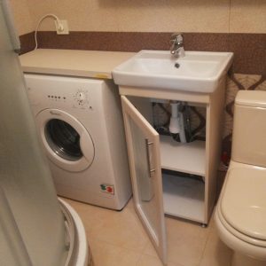 Сучасна підвісна тумба під пральну машину